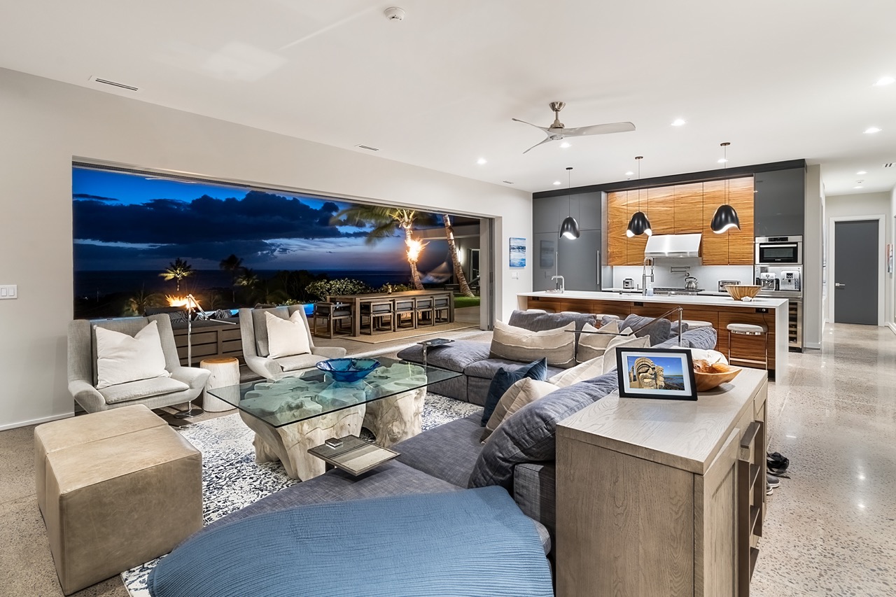Great room and kitchen at twilight