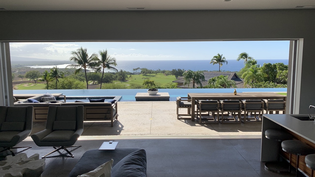 Great room open to pool and Pacific panorama