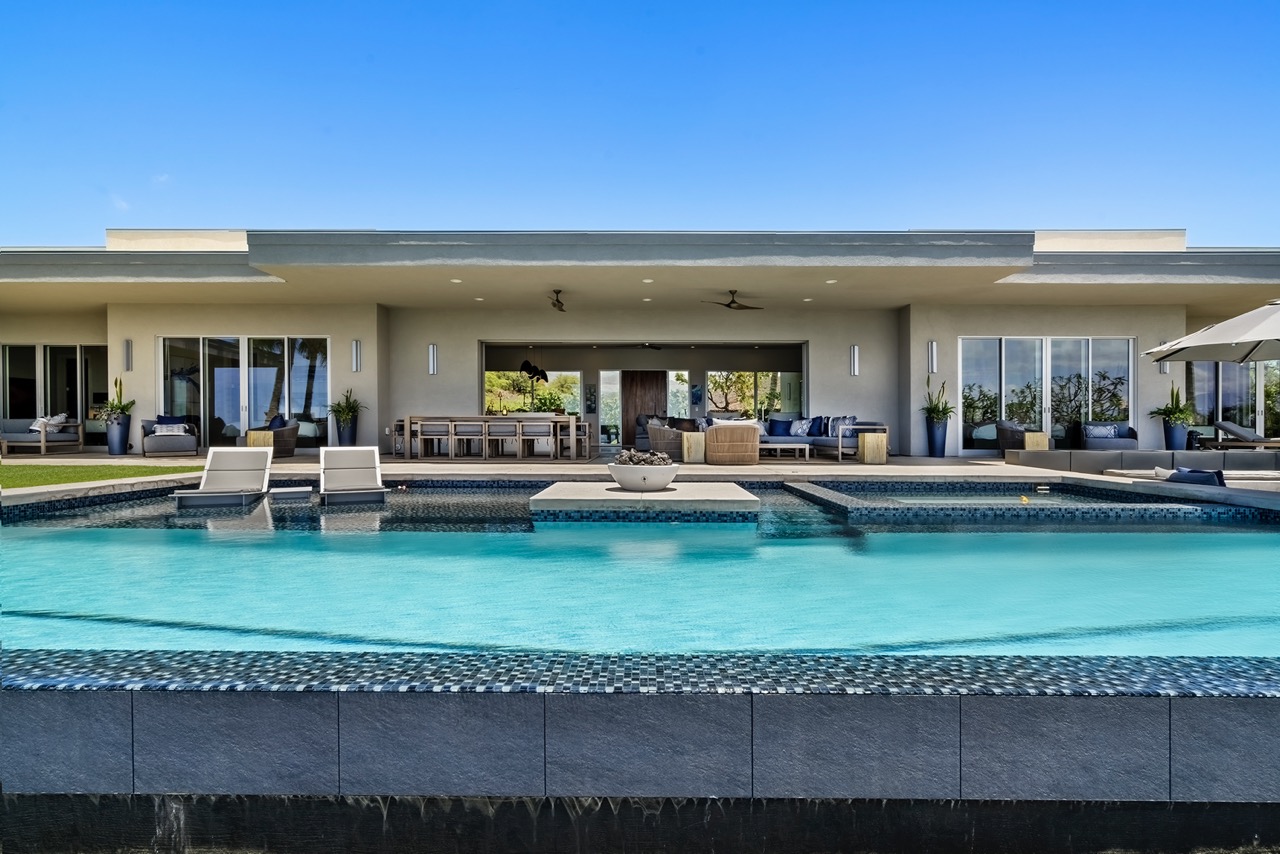 House from pool side — makai view