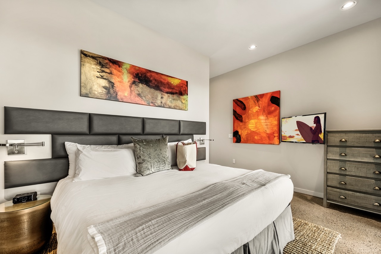 Lave Suite — king bed with lava-inspired artwork