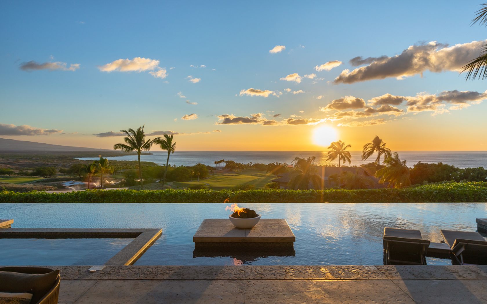 Pool at sunset with fire bowl and Pacific horizon