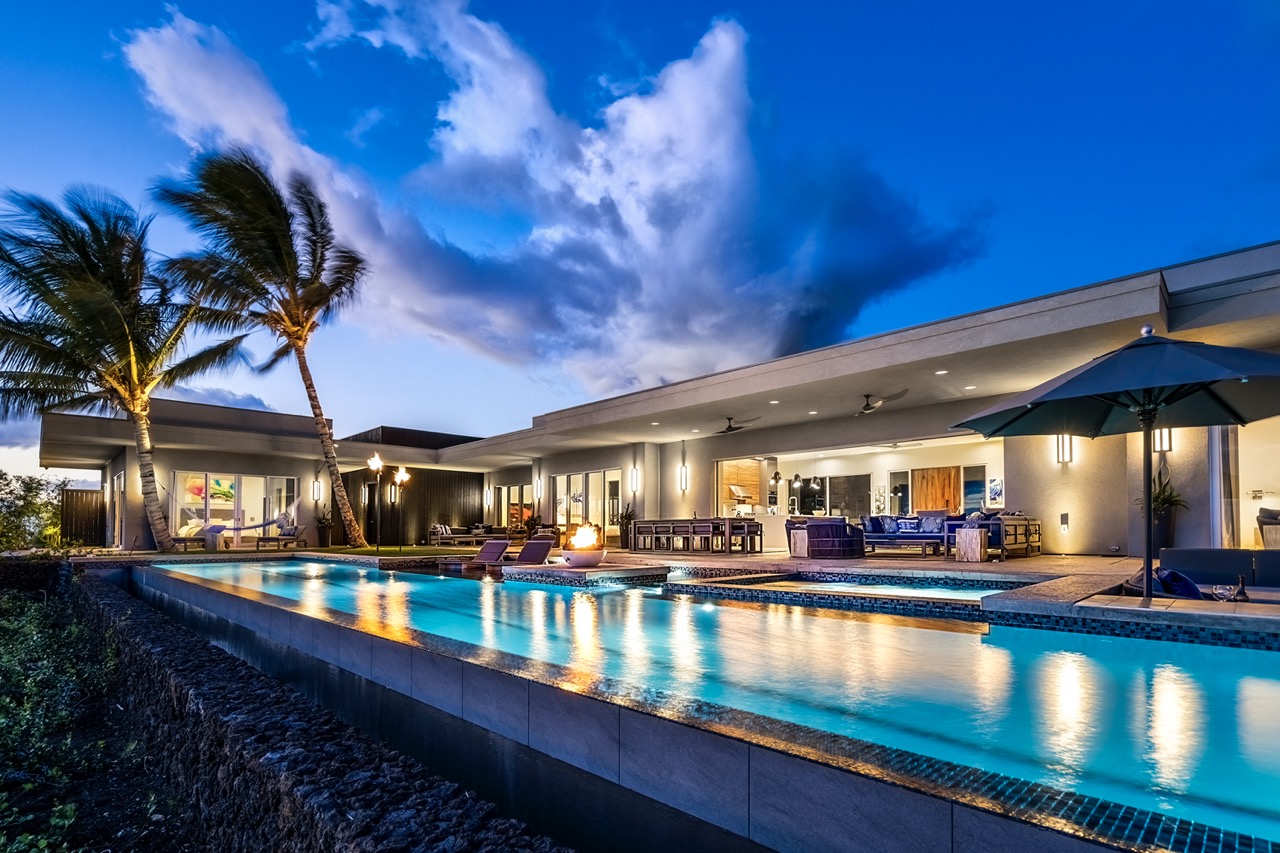 Hapuna Modern House — 72-foot pool and estate at twilight, Mauna Kea Resort